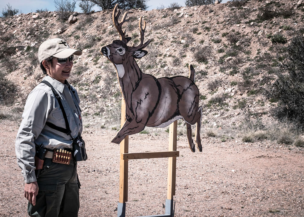 Gunsite instructor Il Ling New uses a remote-controlled deer target to teach shooters the fundamentals of making a shot on a moving target in Paulden, Arizona.
