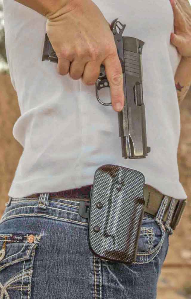 Take your time when you holster. Make sure your finger is off the trigger and that there is no further need to have your handgun out.