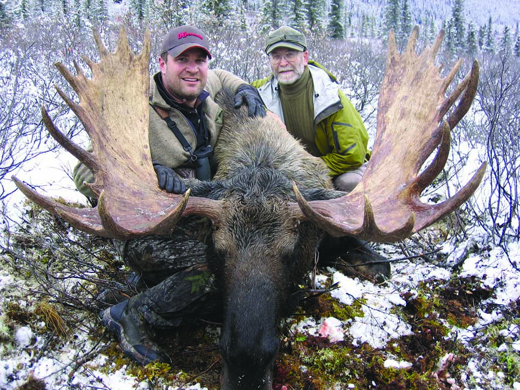 Steve (right) and son Jason Hornady with a bull moose they took using Hornady ammunition.