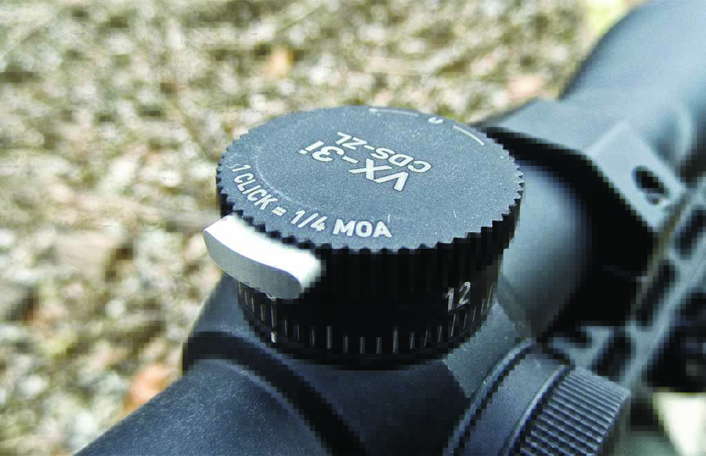 The gray button is popped out when it’s locked at zero. This is an instant and easy way for the shooter to discern that the scope is ready to rock.