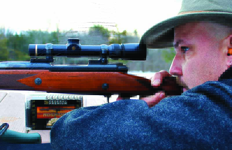 The author checking zero on a Winchester .375 H&H with Leupold VX-3 1.5-5x20mm.