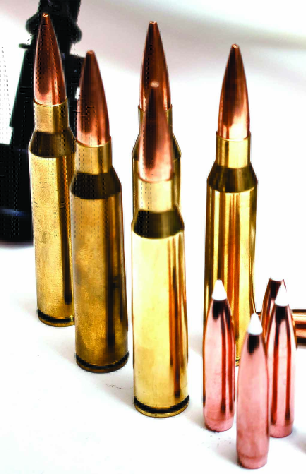The mighty .338 Lapua Magnum, based on the .416 Rigby case, is shown here with the 300-grain Nosler AccuBond and Sierra MatchKings. 