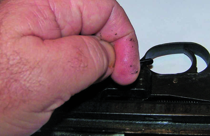 Clean the trigger group, and you may improve the action. The author ran his finger across the action of this carbine and came up with considerable congealed oil.