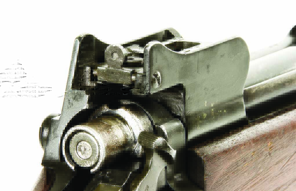 Rear battle sight: Like the front sight, the rear sight of the M1917 is protected by strong ears. The battle sight is an aperture that’s in position for use when the leaf is folded down. The battle sight is designed for a zero at 300 or 400 yards. Sources vary regarding this range. 