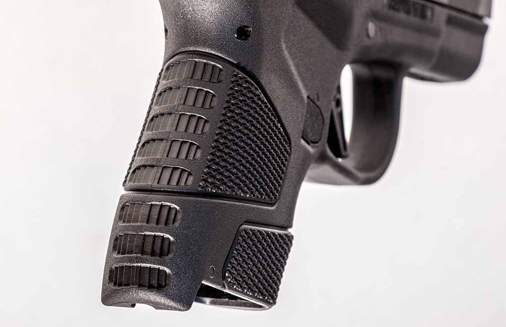 The grip on the Mossberg MC1 SC has wrap around pebbling and serrations on the backstrap.