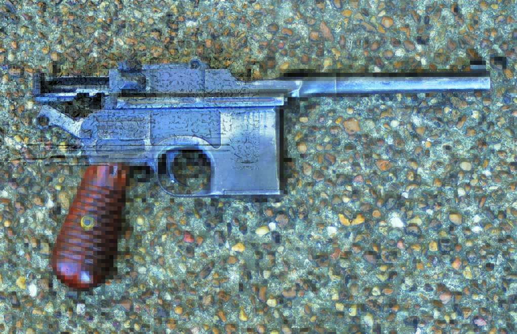 Why The Mauser C96 "Broomhandle" Still Looms Large.