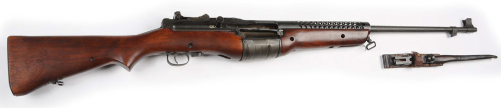 Johnson Model 1941 US.30-.06 caliber semi-automatic rifle with rare bayonet and ‘frog,’ $7,800. Morphy Auctions image
