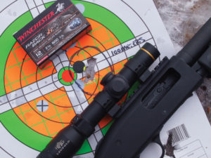 The author’s Mossberg 500 Tactical Tri-Rail pump placed three Winchester XT hog slugs touching at 100 meters. After that, it was time to hunt.