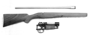 The main ingredients of author’s military-to-sporter conversion were (top to bottom) a 24-inch, 7mm Douglas barrel; a semi-inletted stock blank from Bob’s Custom Gun Shop, of Polson, MT; and the action of a Yugoslav Mauser.