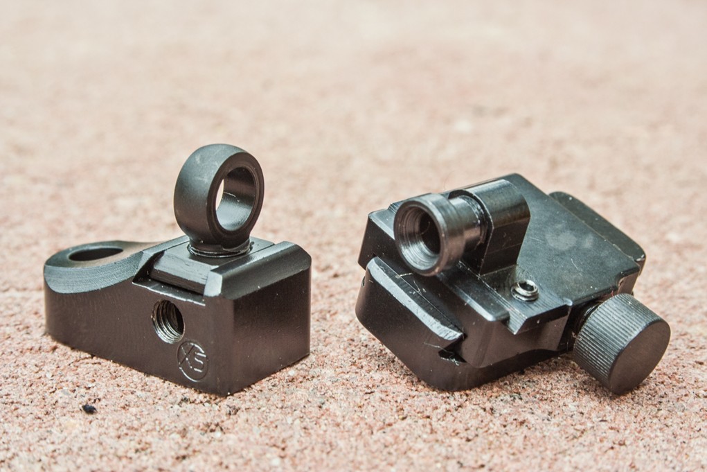 A Talley peep sight that will ﬁ t Talley scope bases (right) is shown next to an XS Sights ghost-ring sight. Both are reliable and rugged open sight options.