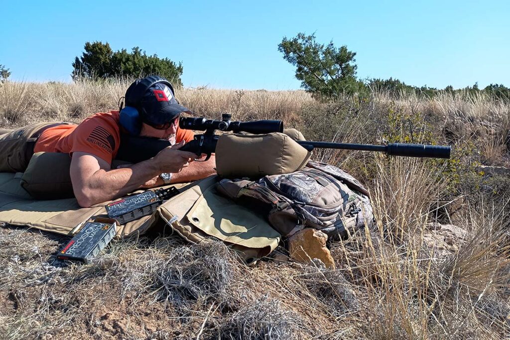 Taking a shot prone at the long-range shooting school.