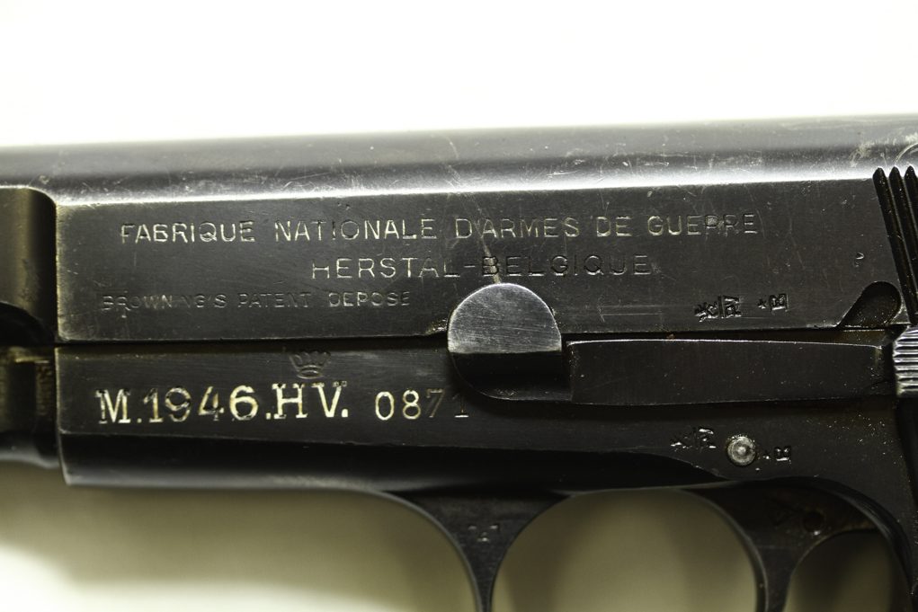 An FN pistol taken into police service in 1946. The proof marks and inspectors’ stamps tell an involved tale. Whole books have been written on marks alone.