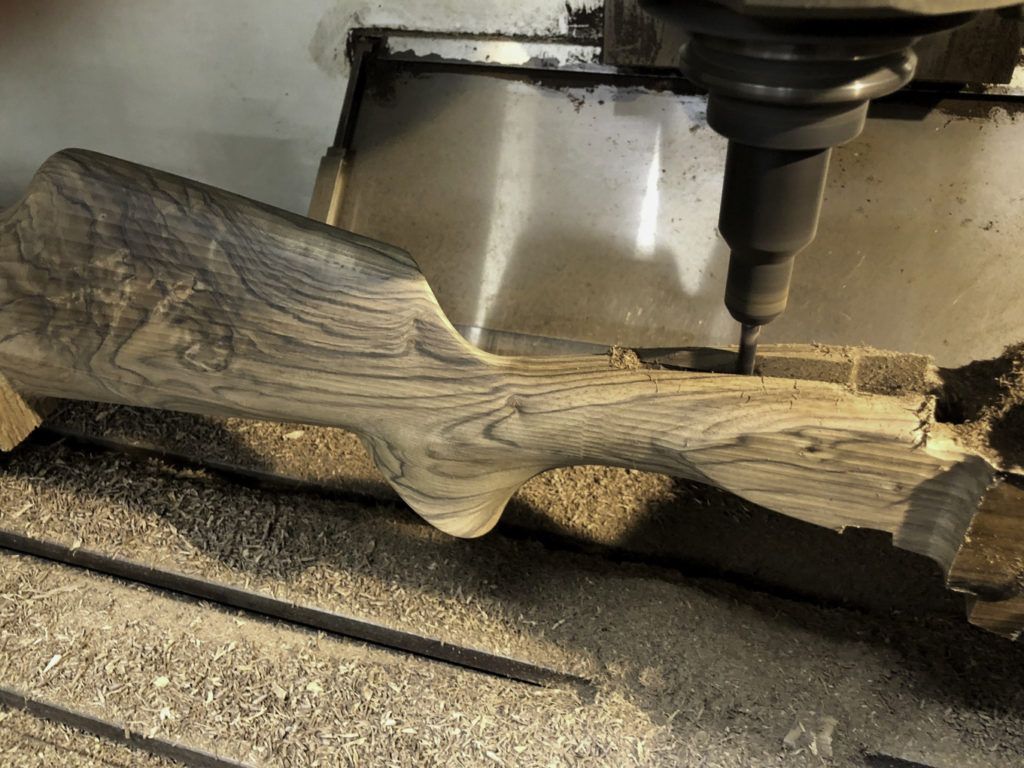A CNC milling machine is used to rough out the shape of all Kolar stocks prior to extensive handwork and application of the finish.