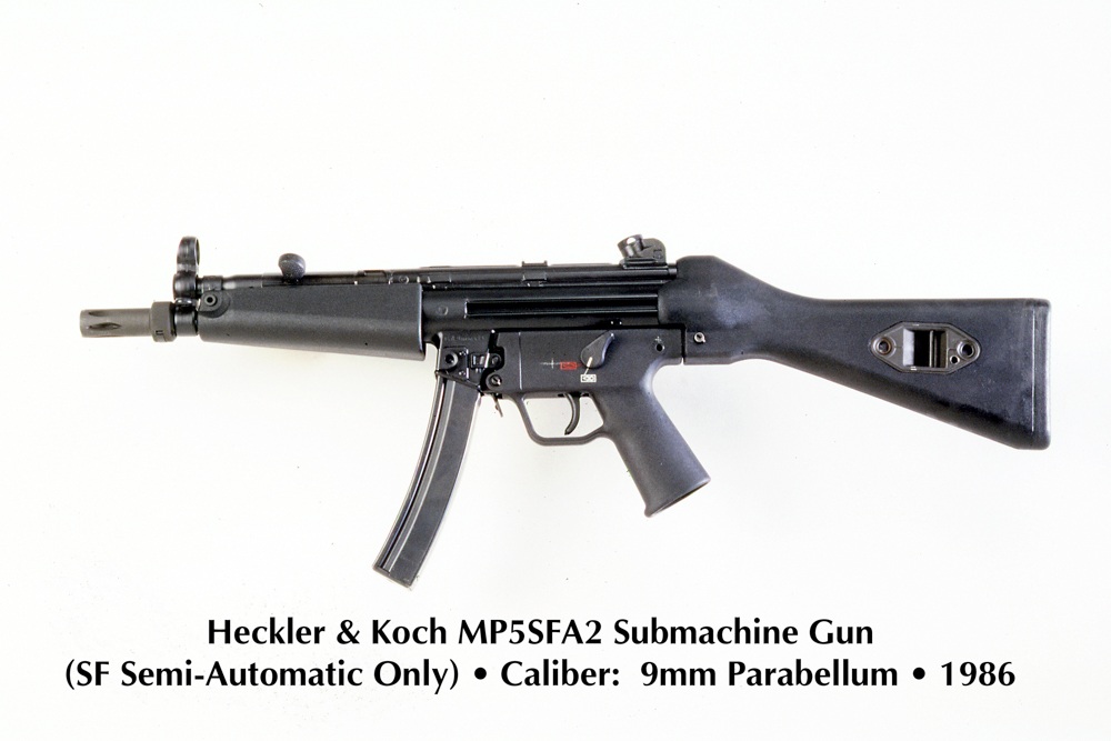 The H&K MP 5 SFA2, which replaced the Tommy Gun. This was the semi-auto-only version with a solid stock for use by non-SWAT agents. It was chambered in 9mm.