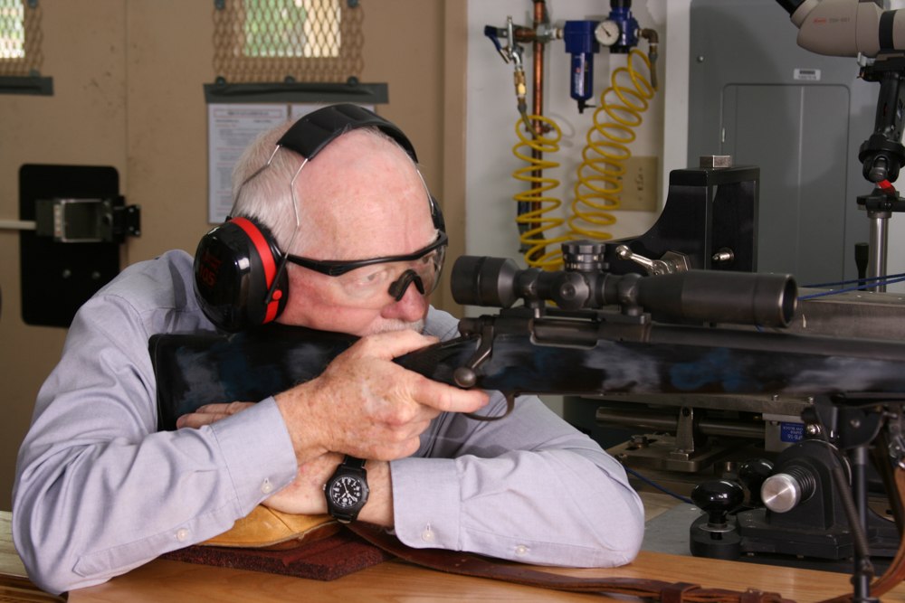 The author behind one of the earlier sniper rifles at the FBI’s Ballistic Research Facility range. Photo: Boone