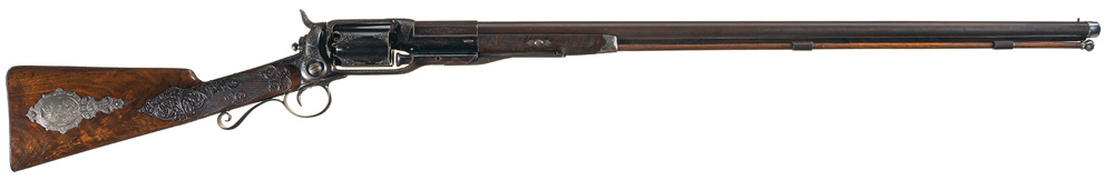 This deluxe, panel scene engraved Colt Model 1855 revolving shotgun achieved $138,000.
