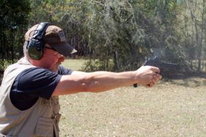 MAG staff instructor Ray Millican, retired Sergeant-Major from Special Forces, demonstrates rapid fire control with S&W M&P CORE and carry optics.