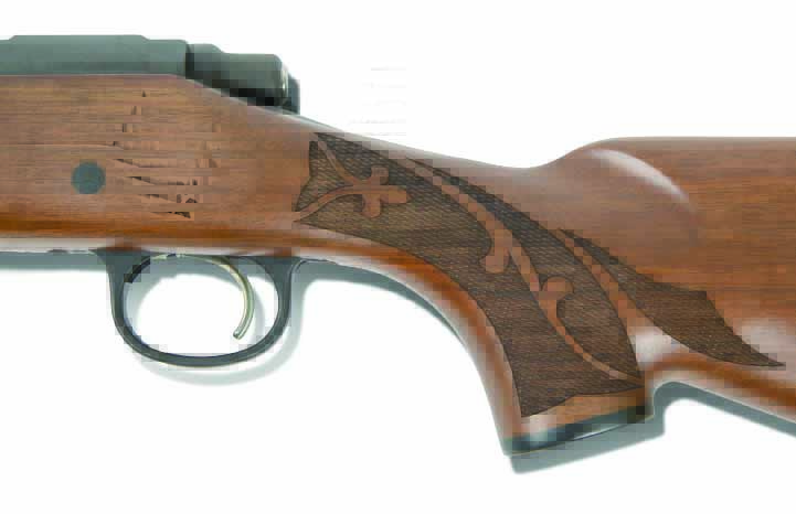 Fleur-de-lis checkering pattern on an ADL Limited Edition commemorating the 200th Anniversary of the Remington Company.
