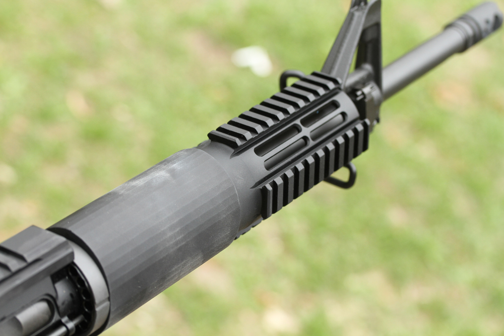 The Elite Operator forearm, an aluminum tube with integral rails on the front portion.