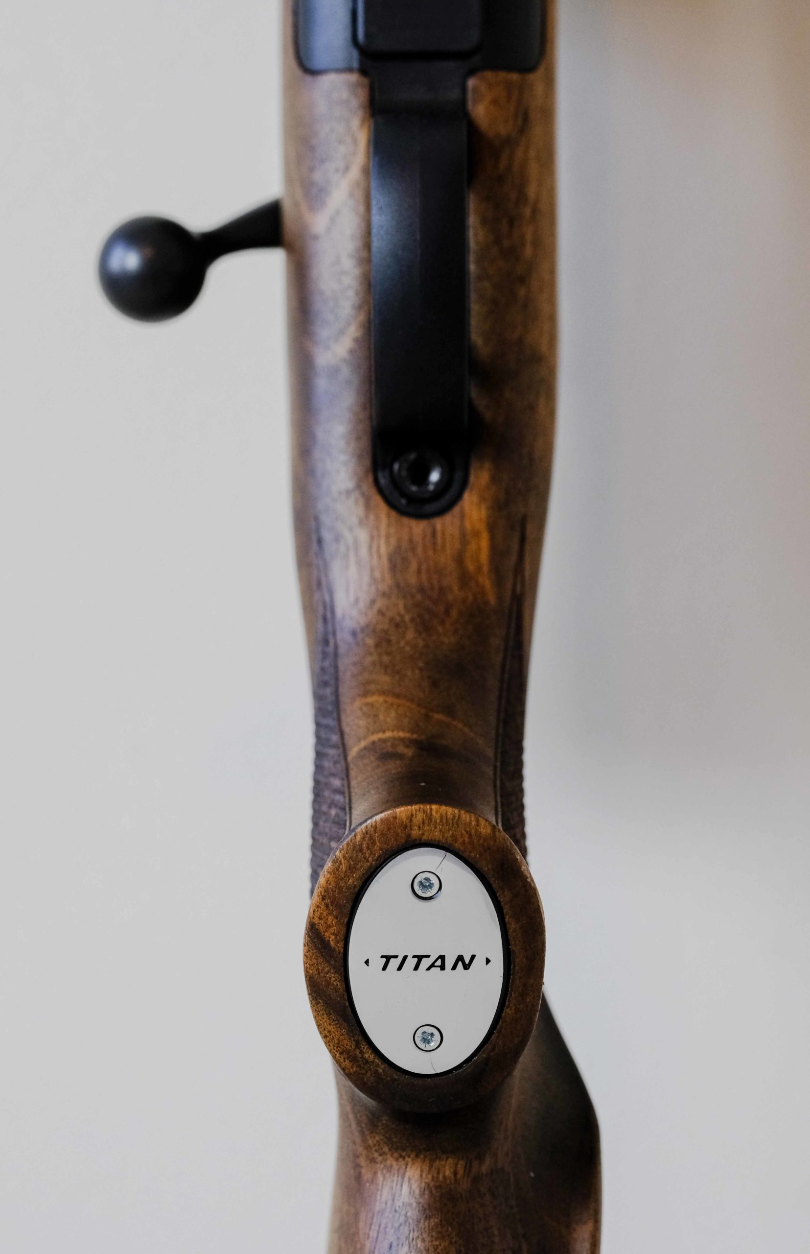 The craftsmanship of the rifle is seen in the metal, the fit and the wood. The pistol-grip plate proudly tells owners they have a Titan rifle in their hands.