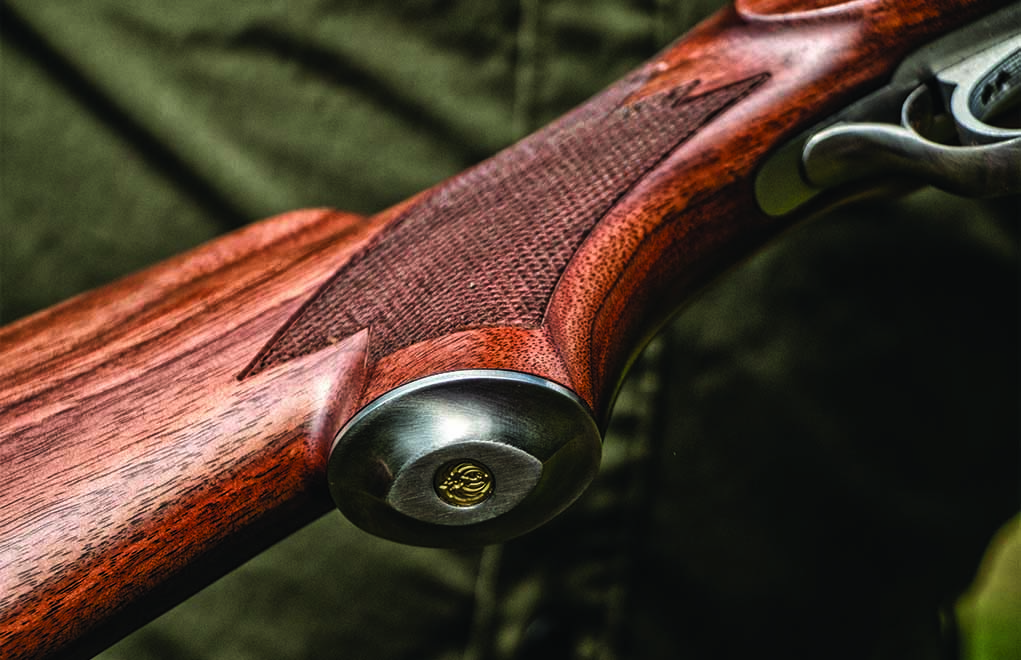 The grip of the Lipsey’s Ruger No. 1 in .30-30 Winchester has a stainless cap with a brass Ruger emblem inlay.