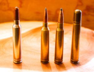 The 300 Win. Mag., left, was the fourth cartridge in a series of belted magnums designed to fit in a standard long action. The other Winchester magnums are, from left to right, the .264, .338 and .458, all based on the .375 H&H Mag. case.