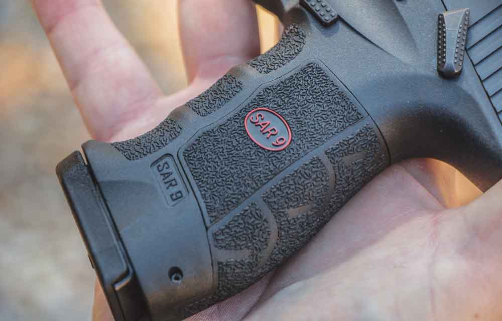 The grip on the SAR 9 has a removable backstrap and center panels to help you better fit the pistol to your hand.