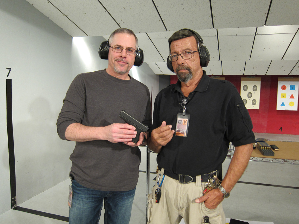 The author, Gun Digest Publisher Jim Schlender, left, joined author Massad Ayoob for a firsthand look at the new Glock 43 at the Glock range in Smyrna, GA. Ayoob serves on the board of the Armed Citizens Legal Defense Network. 