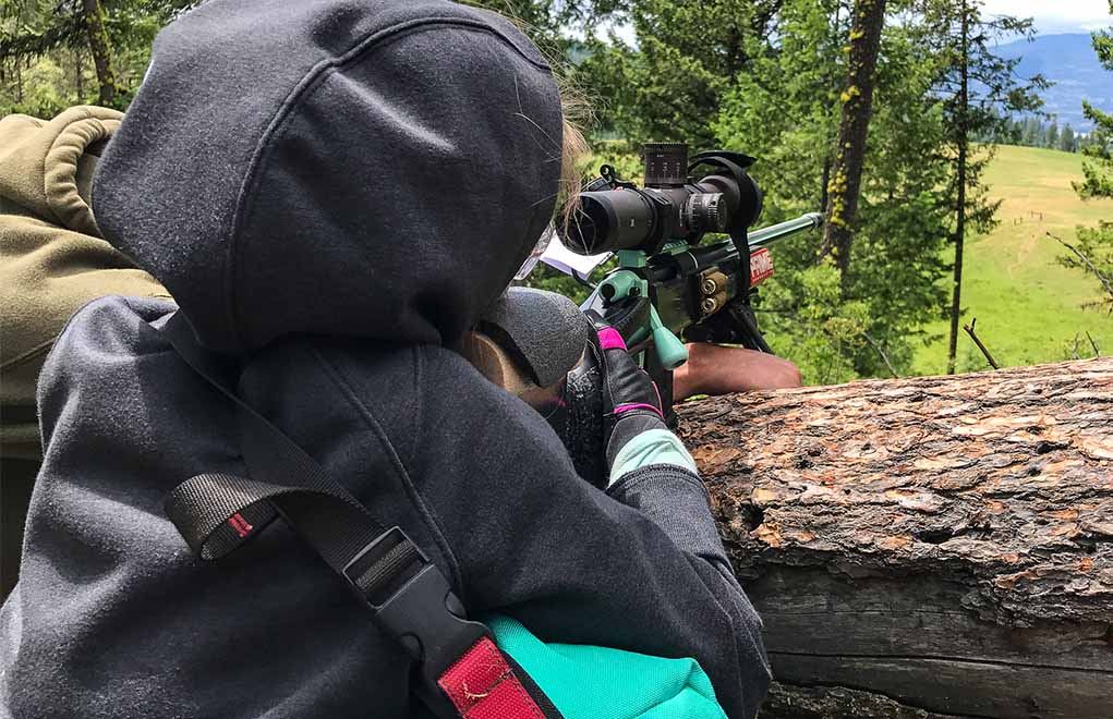Here’s a practical application of a supported position found during the Sniper’s Hide Cup. In this example, we’re shooting off a log, through the trees and into a field. 