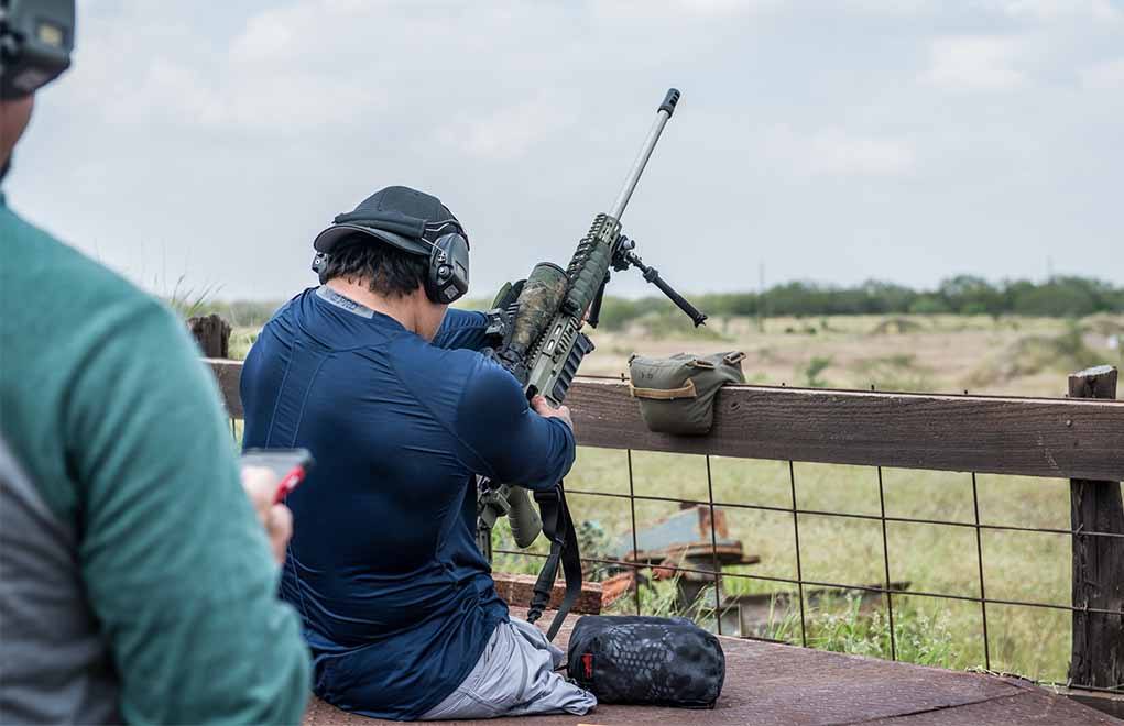 During the Sniper’s Hide Cup Competition, competitor and military veteran Jorge O. sets up his shot off a section of fence, using a Game Changer Bag to bridge the position.