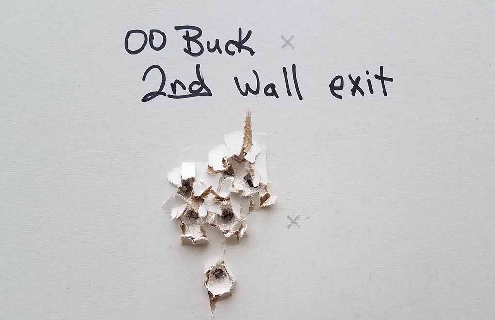 Pattern from No. 00 buck, fired from 15 feet, detailing the exit from back of the second wall.