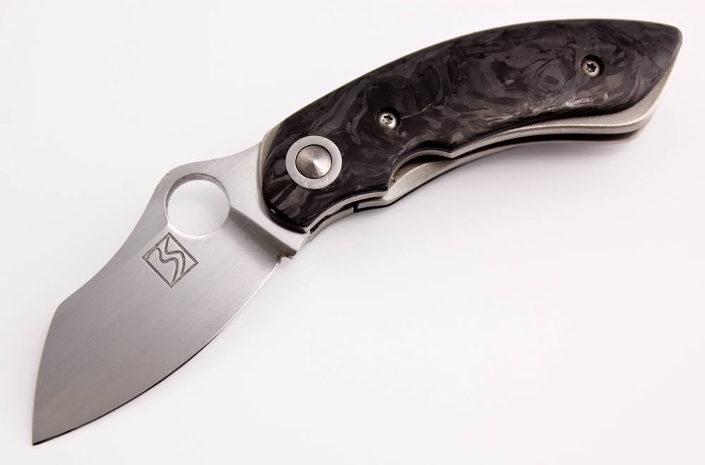 The Brad Southard “Downing” LinerLock folder, showcases marbled carbon fiber handle scales, titanium liners, a 2.125-inch blade and a pocket clip.