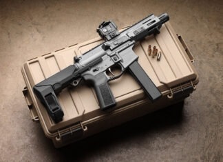 First Look: Springfield Saint Victor PDW Springfield Saint Victor PDW laying on a tan crate.