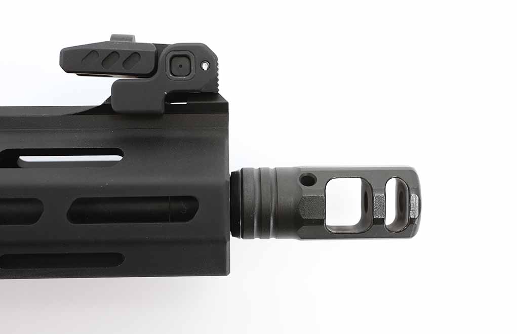 The muzzle brake works? Oh, yes, it does! And the spring-loaded sights are out of the way until you want them.