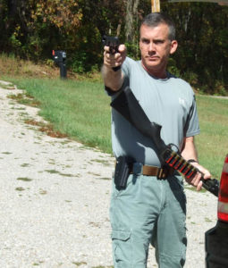 A pistol is the perfect backup for a survival shotgun.