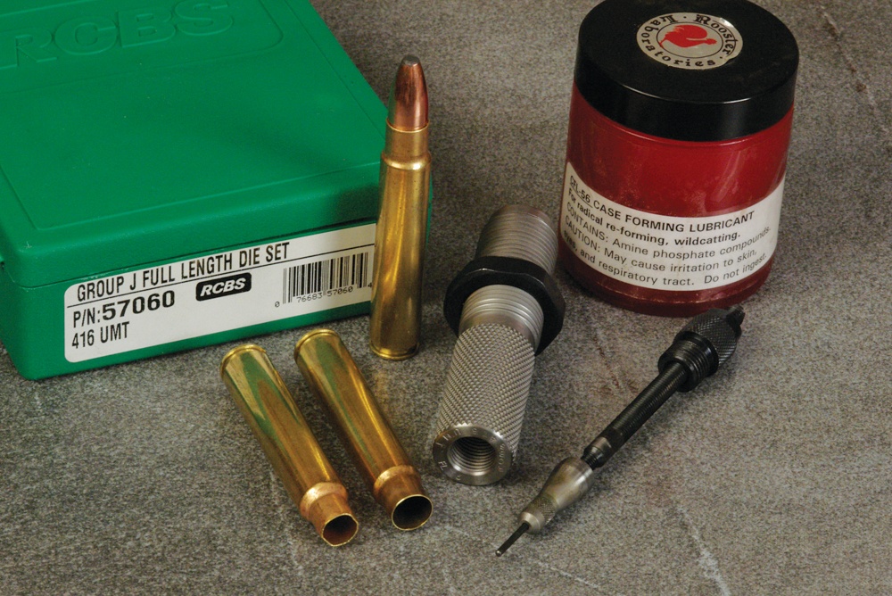 RCBS .416 UMT dies with cases and lube. One pass over the tapered expander in the RCBS resizing die will neck the .375 RUM up to .416. To increase neck tension, polish a small amount of material off the neck sizing button. Lubrication is important for sizing cartridge cases. But, it requires just the right amount.