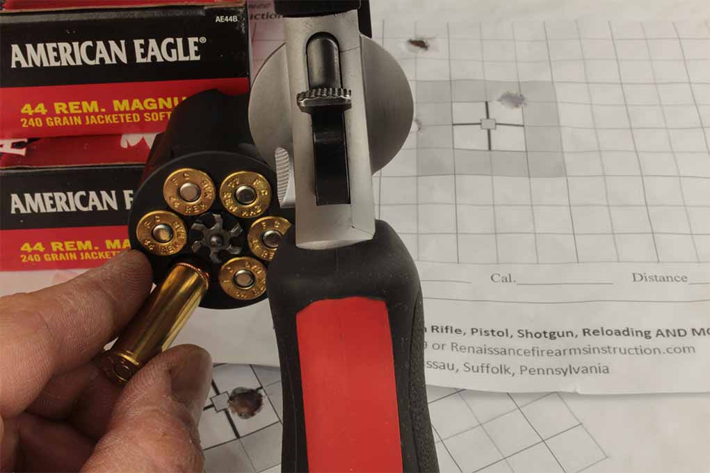 Federal’s American Eagle line of ammo has always made affordable practice sessions a reality. Here, the author is loading that sixth chamber while confirming an initial zero. Also shown is the signature red backstrap that’s responsible for reducing some of the felt recoil.