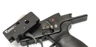 Hardware Talk: Timney HK MP5 Trigger A Timney HK drop-in trigger resting on top of an MP5 SEF lower.