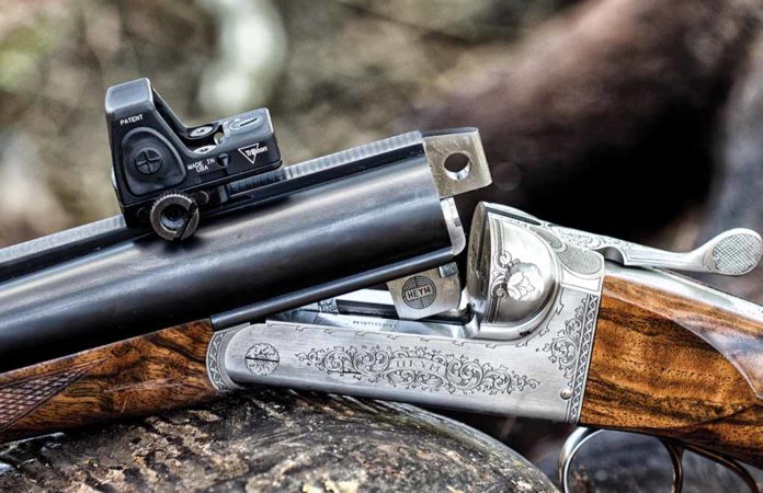 A Trijicon RMR atop a Heym Model 89B in .450-400 3-inch Nitro Express. The little red dot extends the effective range of the double rifle.