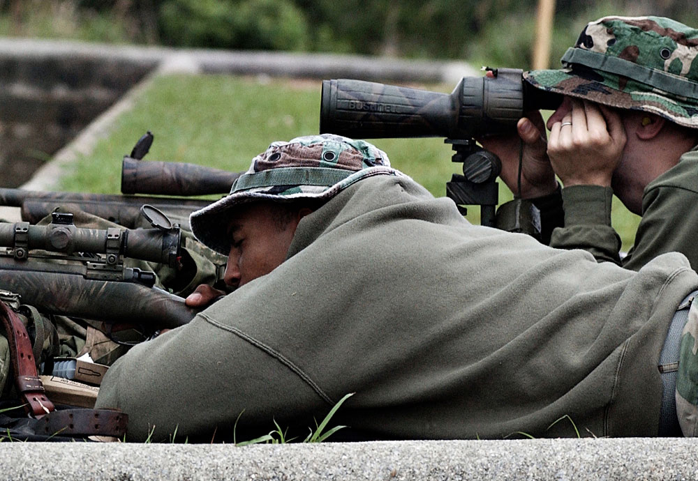 USMC Sniper and spotter practicing