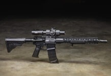 Griffin Armament: Behind The Brand A Griffin Armament AR-15 equipped with Griffin Armament accessories sitting on a concrete floor.