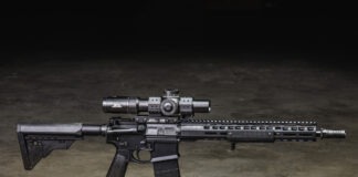 Griffin Armament: Behind The Brand A Griffin Armament AR-15 equipped with Griffin Armament accessories sitting on a concrete floor.
