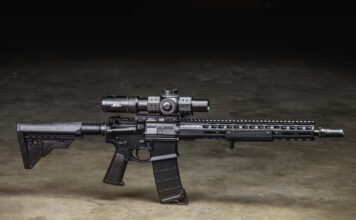 Griffin Armament: Behind The Brand A Griffin Armament AR-15 equipped with Griffin Armament accessories sitting on a concrete floor.