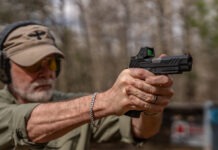Irons Vs. Red Dots For Carry Pistols: Which Is Better? irons vs red dots aiming 1