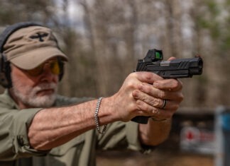 Irons Vs. Red Dots For Carry Pistols: Which Is Better? irons vs red dots aiming 1