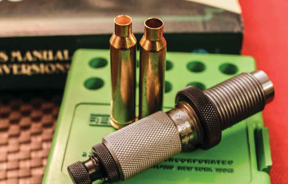 A 7mm Remington Magnum case (L), and a converted .30-338 Magnum case (R), made with one pass through a Redding resizing die.