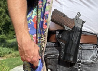 Carrying The Springfield SA-35 Compact A Springfield SA-35 4-inch in a DeSantis OWB holster.