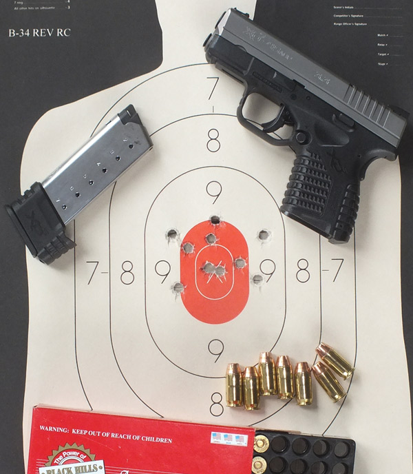 The good trigger and sights allow real accuracy with these guns. I made no adjustment to get this well centered up group. Ten shots Ten yards Standing, Two magazines.